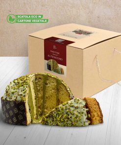 Bronte store pistachio panettone filled with pistachio cream, on a wooden table with white boards, in a room with a coffee-coloured wall.