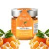 "Bronte Store brand jar of Sicilian mandarin marmalade, with orange label and silver cap. Several mandarins framing.