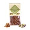 Bronte store-brand pistachio crispy nougat with caramel on the left and shelled Bronte pistachios on the right